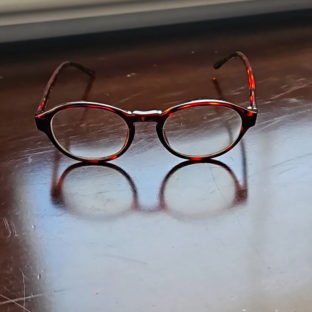 Small frame brown glasses with prescription lenses. Fits preteen